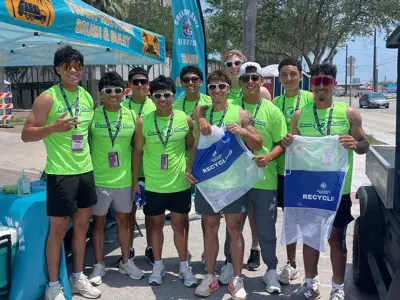 Ten volunteers at a recycling event