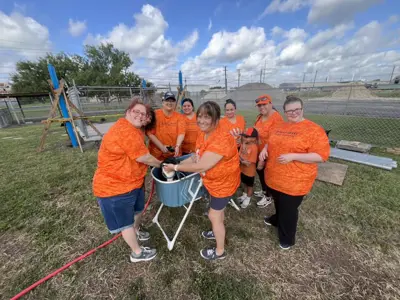 Group photo of volunteers bathing pets
