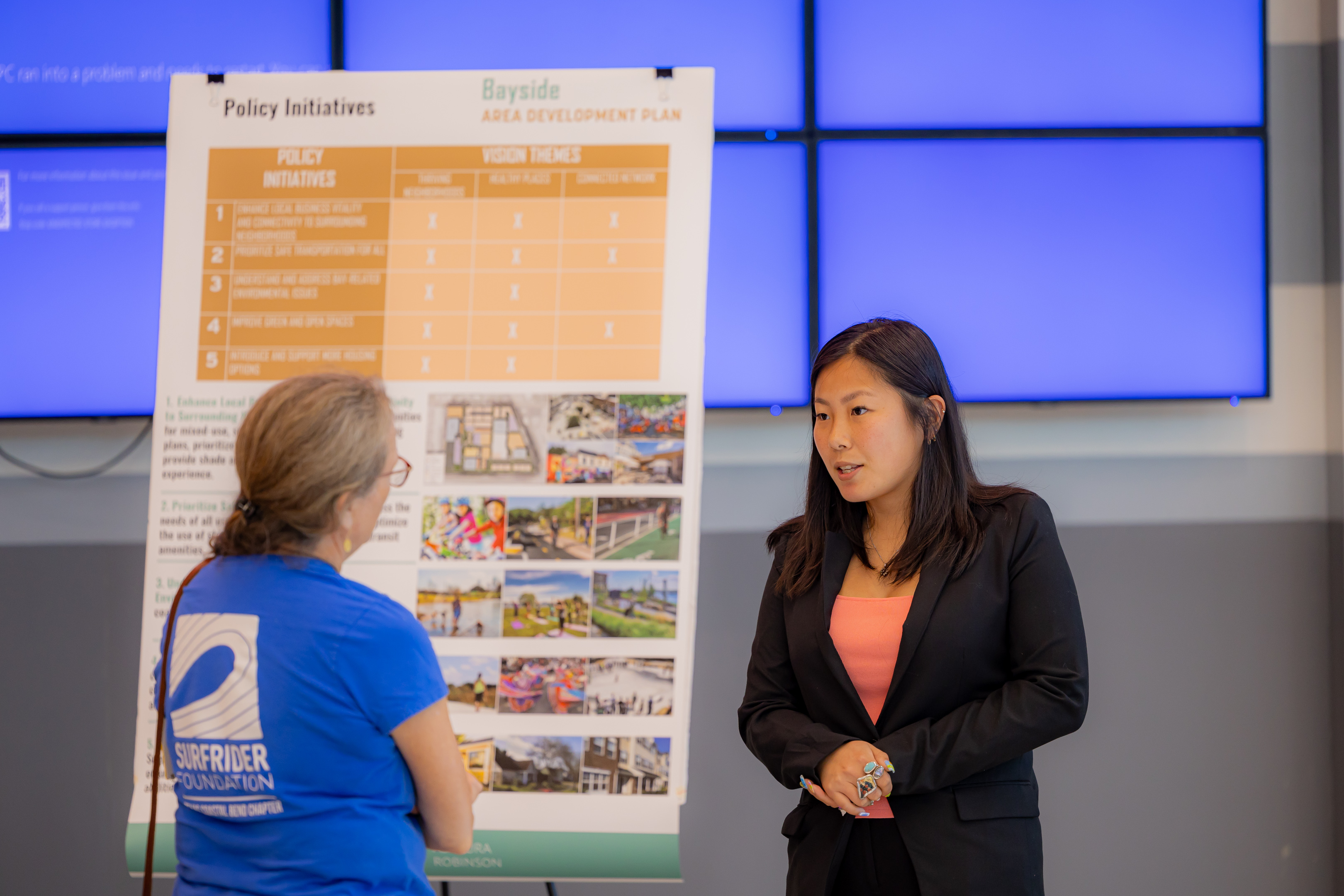 Women Talking at Community Meeting