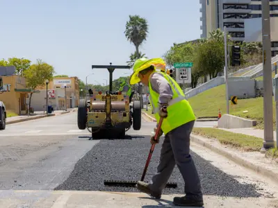 Man resurfacing street