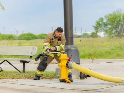 Firefighter opening fire hydrant